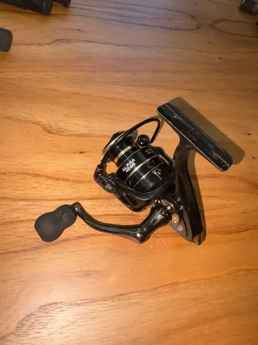 2 molinetes alpha 4000 + vara alpha 1652 e vara sabre