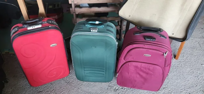 Três malas de bordo de mão 