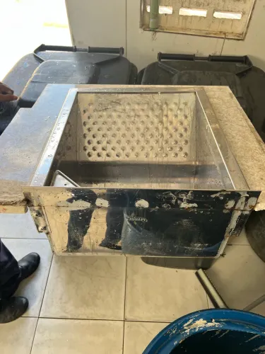 Banhada de mármore usada com o lavador