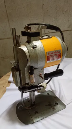 Máquina de corte tecido