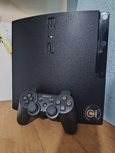PS3 SLIM DES. HEN C/ JOGOS [SPARTA GAMES]