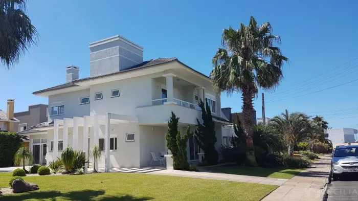 Linda casa em Condomínio à venda em Capão da Canoa no Condado de Capão REF: 4747