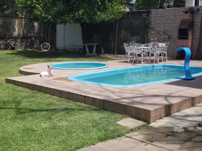 casa com piscina e churrasqueira, 3 quartos 550 diária