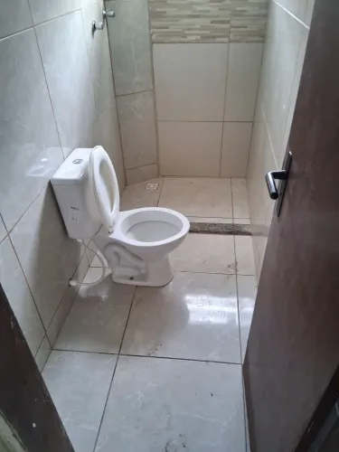 Vendo casa com lage batida e terreno grande