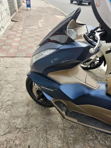 Vendo:Pcx Dlx azul com pequeno sinistro