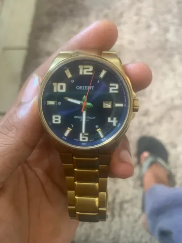 relogio orient dourado