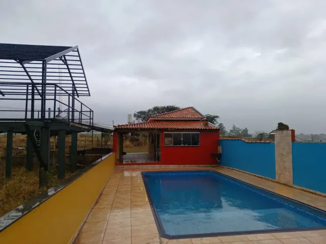 sitio em cajuru 1 alqueire 470.000.00 ( emi )