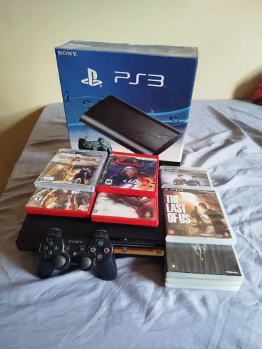 Vendo PS3 Slim BLOQUEADO completo na caixa com 11 jogos
