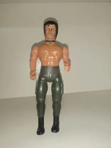 BONECO RAMBO GLASSLITE ANOS 80