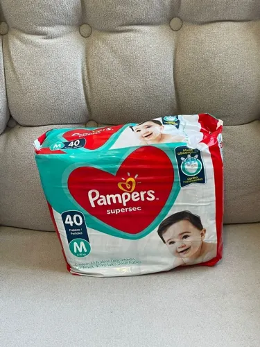FRALDAS PAMPERS E HUGGIES KIT