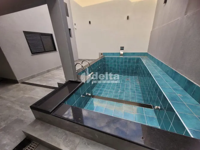 Casa residencial disponível para venda no bairro Aclimação em Uberlândia-MG