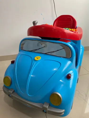 Carrinho de bebê fusca azul