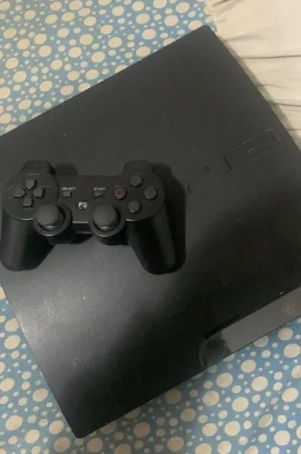 Vendo console PS3 em ótimo estado.