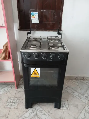 Fogão semi novo marca MUELLER.Não faço entrega.