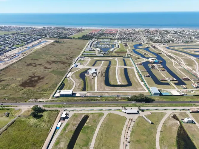 Terreno à venda no Condomínio Wave Home Resort, em Xangri-Lá, com 263m². REF: