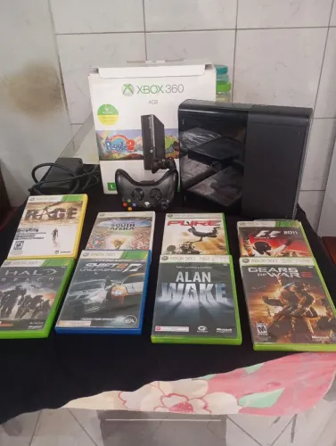 Vende -se um Xbox 360 original bloqueado,+oito jogos originais semi novo.