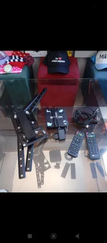 Converso pra transformar sua televisão em esmart , vai com o suporte