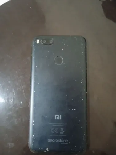 Placa mãe do celular xiomi mi a1 funcionando perfeitamente e só colocar a tela 