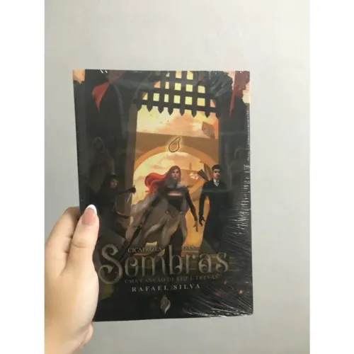 LIVRO CICATRIZES DAS SOMBRAS UMA CANÇÃO DE LUZ E TREVAS DE RAFAEL SILVA