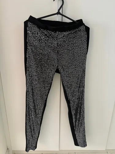 Calça de paetê