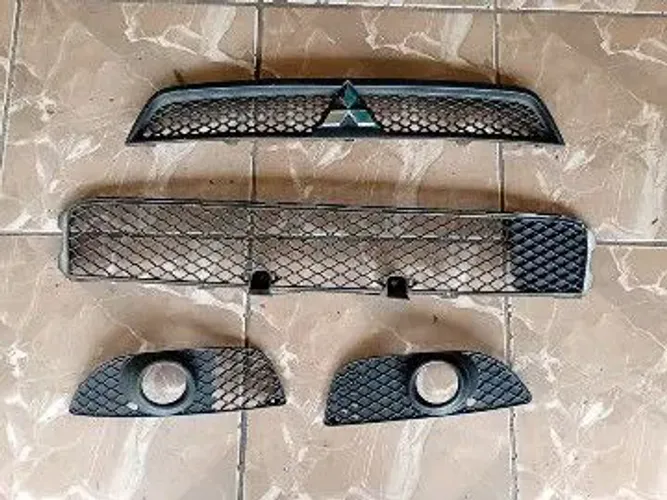 Conjunto Grade Mitsubishi Lancer