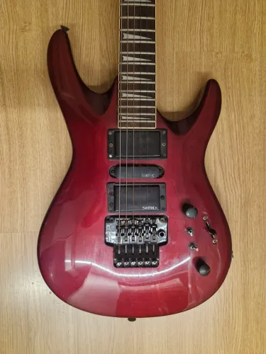 Guitarra usada Samick com avaria.