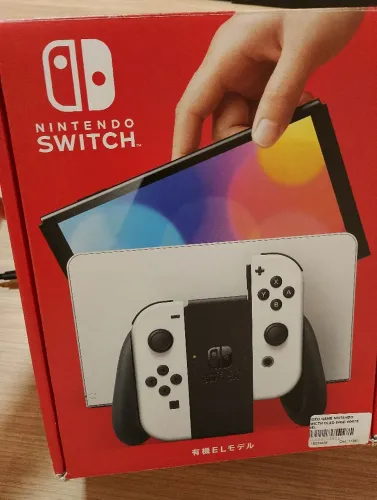 Nintendo switch na caixa com pouco uso e com muitos acessórios