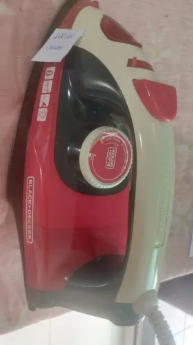 Ferro de passar roupa a vapor