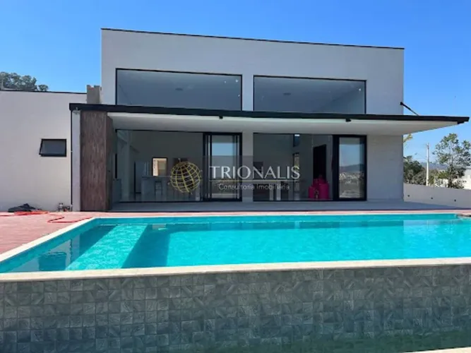 Casa com 4 dormitórios à venda, 396 m² por R$ 2.100.000,00 - Condomínio Alto da Floresta -