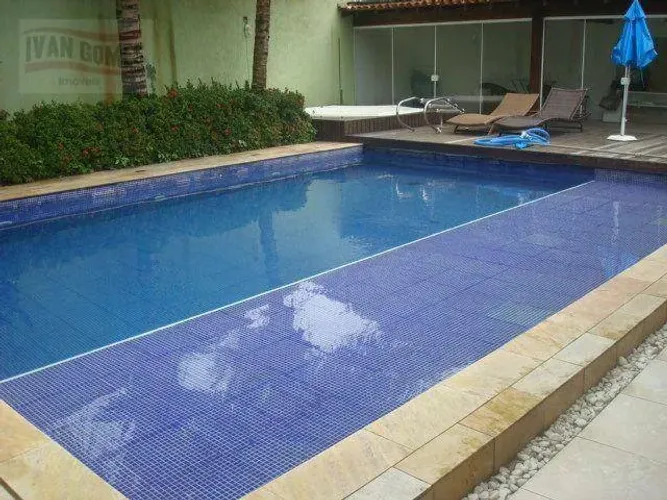 Casa com 4 dormitórios à venda, 220 m² por R$ 1.500.000 - Jardim Guaiuba - Guarujá/SP