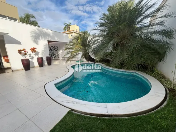 Casa alto padrão em condomínio, com 4 suítes, disponível para locação e venda no bairro Ja