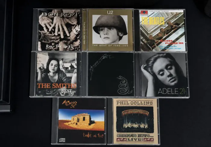 Lote de 7 cds de rock internacional e 1 de pop