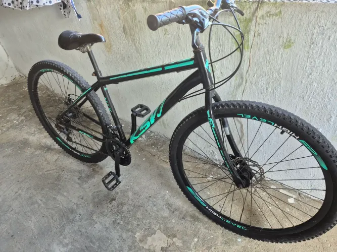 Bicicleta Aro 29 Aço Carbono Freios A Disco Suspensão 21 Vel