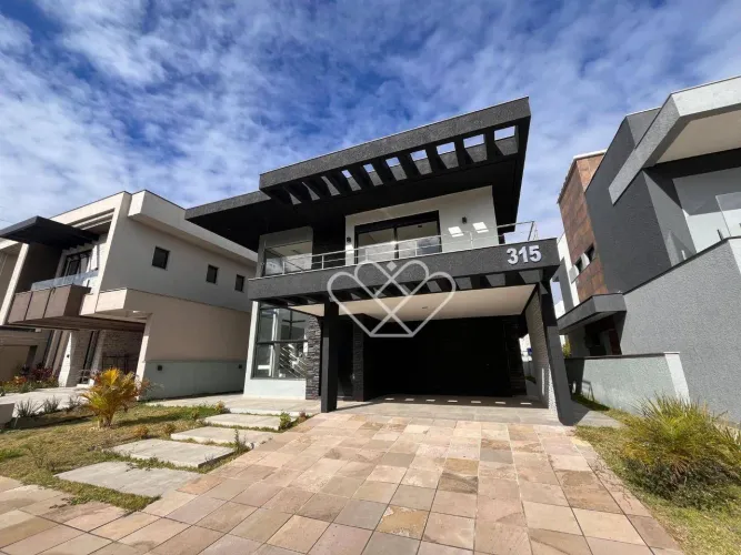 Casa de alto padrão à venda e locação no condomínio City Park Residence em Gravataí
