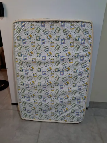 Berço portatil e o colchão 