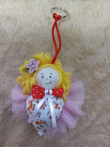 Chaveiro menina borboleta
