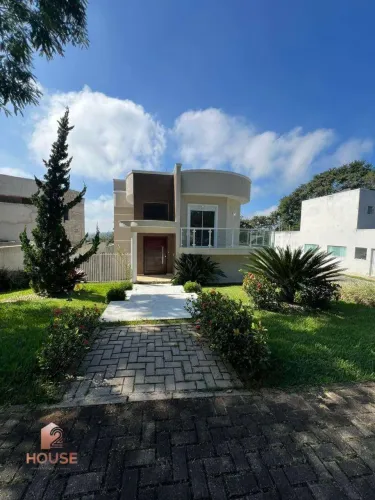 Casa com 4 dormitórios à venda, 270 m² por R$ 2.200.000,00 - Condomínio Reserva Ibirapitan