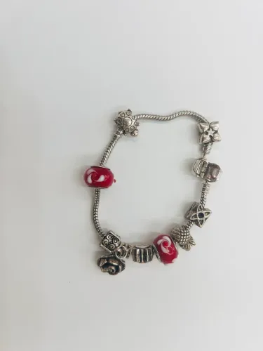 Pulseira de prata com berloques