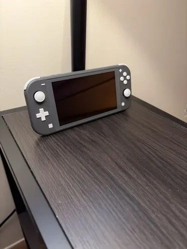 Nintendo switch lite 32gb COM JOGOS zerado na caixa