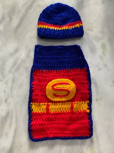Conjunto de chapéu e capa do Super-Homem para bebê
