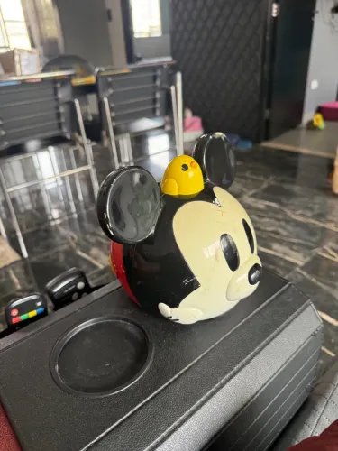 Carrinho Mickey com passarinho