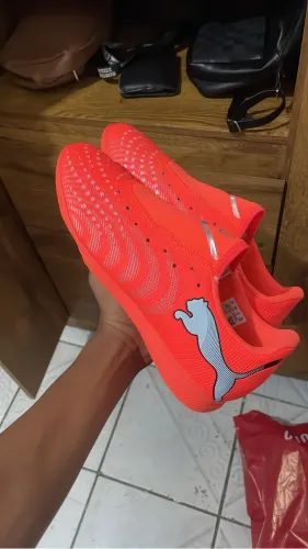 Chuteira de futsal puma laranja