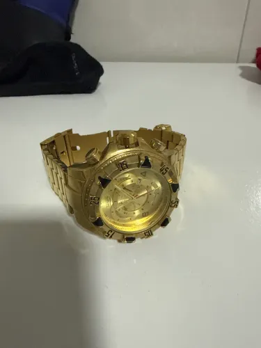 Relógio dourado masculino