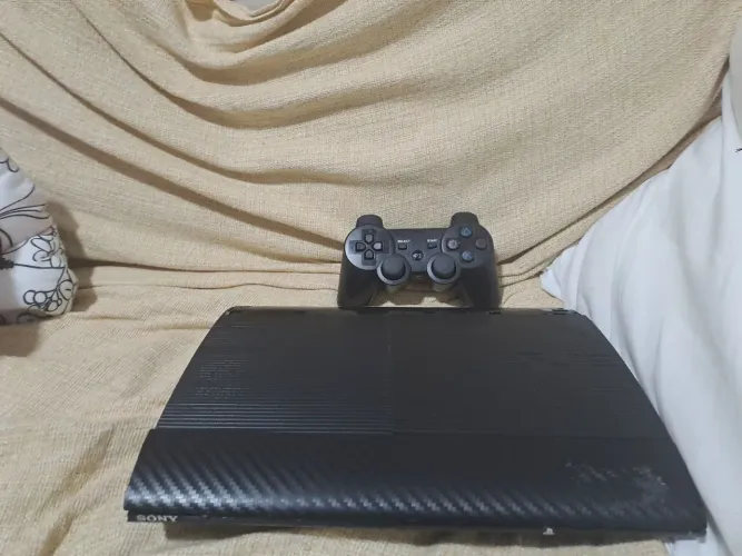 Vendo ps3 desbloqueado com controle e base de carregamento