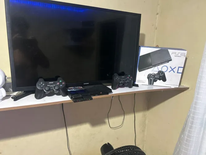 Ps2 zerado com caixa do play
