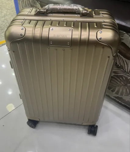 Mala de bordo Rimowa dourada nova
