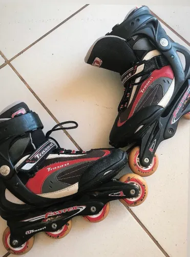 PATINS TRAXART FASTER ABEC 5
