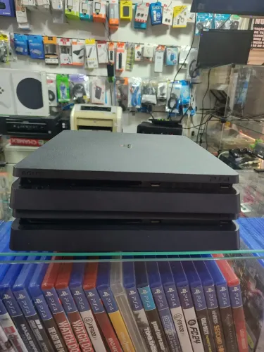 Playstation 4 Slim 1TB com 2 versão 9.6 (Somos Loja Envio OLX)