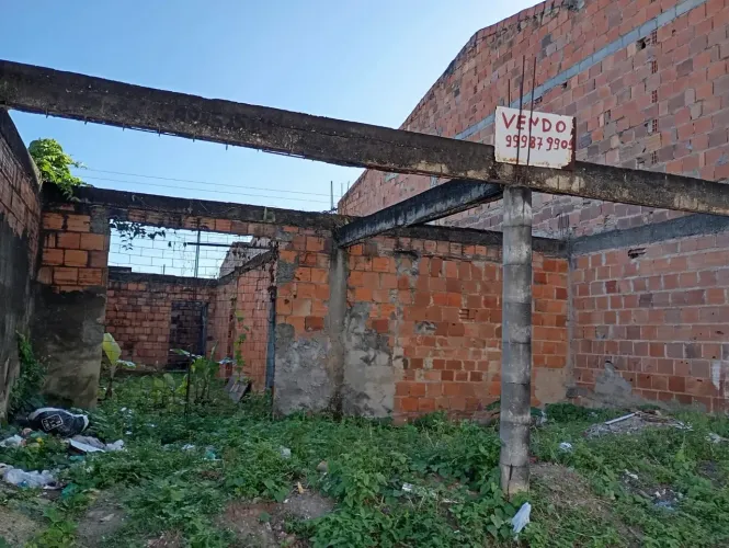 Vendo terreno com casa