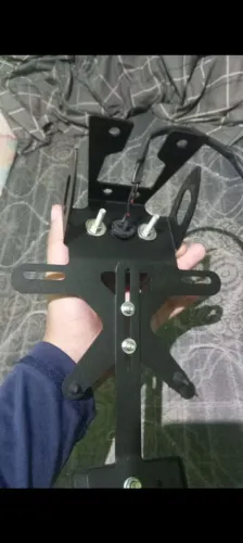 Vendo este suporte de placa slim universal